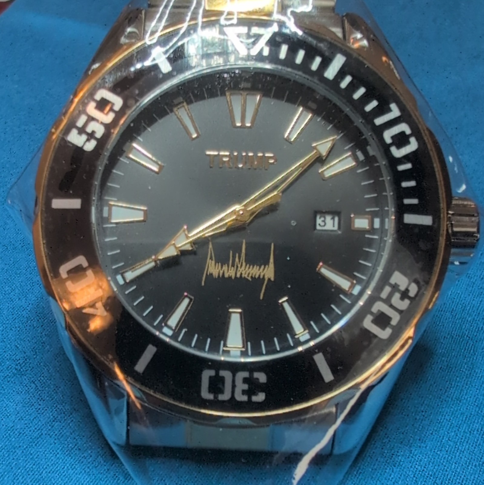 Trump Signature Analog Wristwatch Black Dial Stainless Steel Band Date Indicator